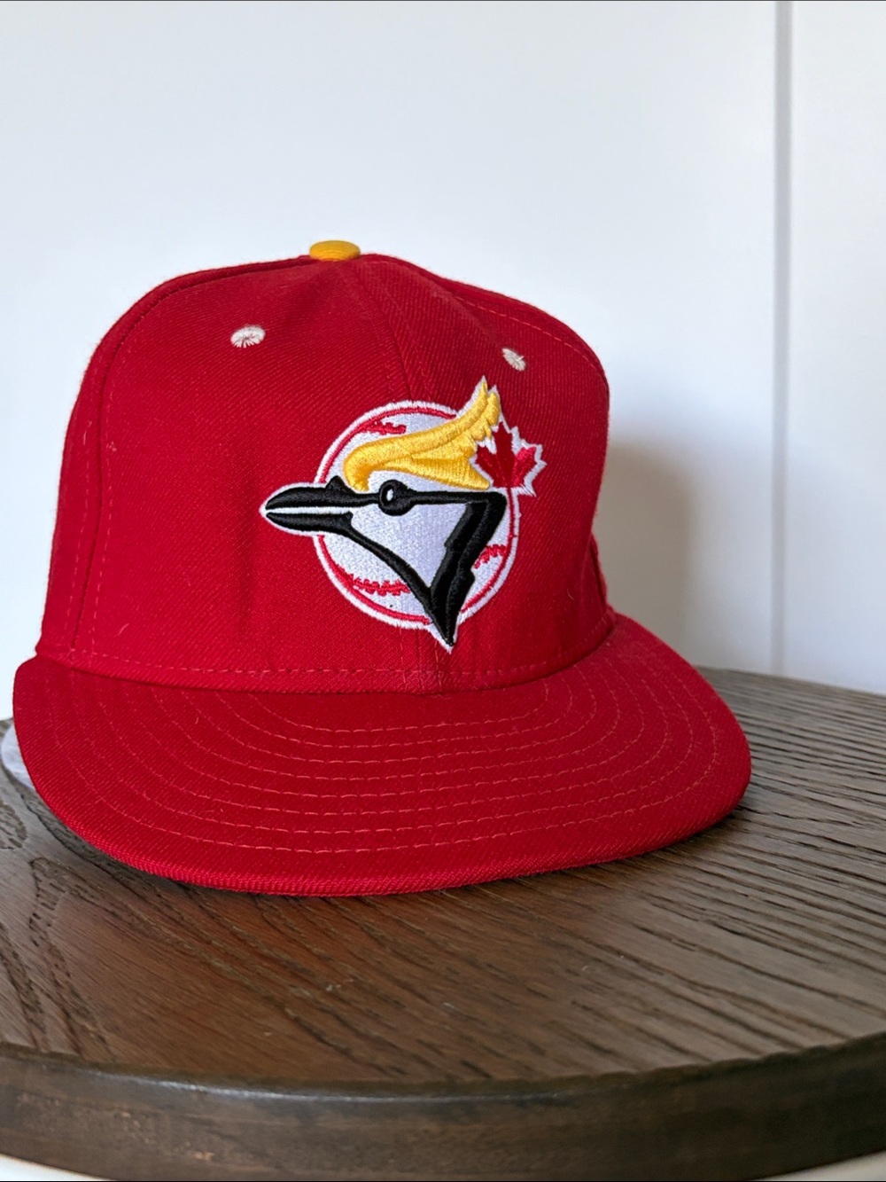 Red New Era 7&1/8 fitted Toronto Bluejays Baseball Hat.